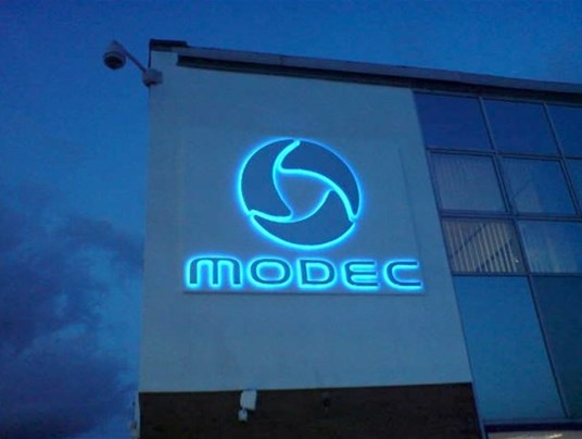 Modec Silver Acrylic Signage Illuminated With Blue Lighting Warwick