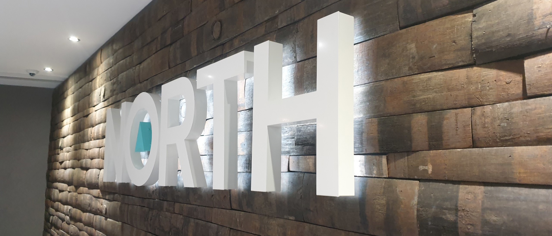 Interior Backlit Illuminated Logo Sign For North By Signs Express Glasgow