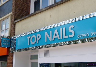 Fascia And Projecting Sign With Brushed Aluminium Stand Off Letters And Silver Shimmer Discs For Top Nails, Exeter