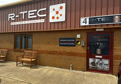 Aluminium signage fitted onto cladding, fitted to complete the external branding for the Rational Tec office.