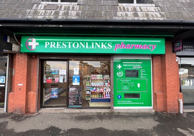 Prestonlinks Pharmacy Prestonpans, Illuminated sign tray with push through acrylic letters, to further enhance the illumination to the shopfront a trough light was also installed, we even produced the custom graphics to wrap the automated dispenser