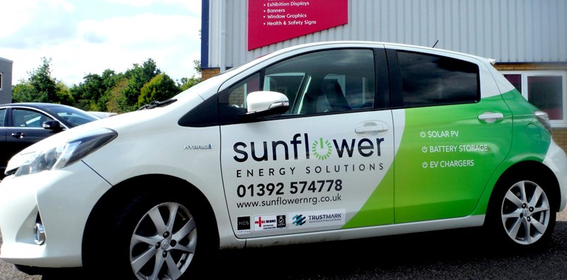 Partial Vehicle Wrap/Cut Vinyl Text/Accreditation Logo’s On A Toyota Yaris By Signs Express (Exeter) For Sunflower Energy Solutions