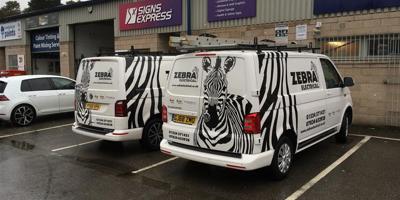 Zebra electrical fleet vehicle graphics