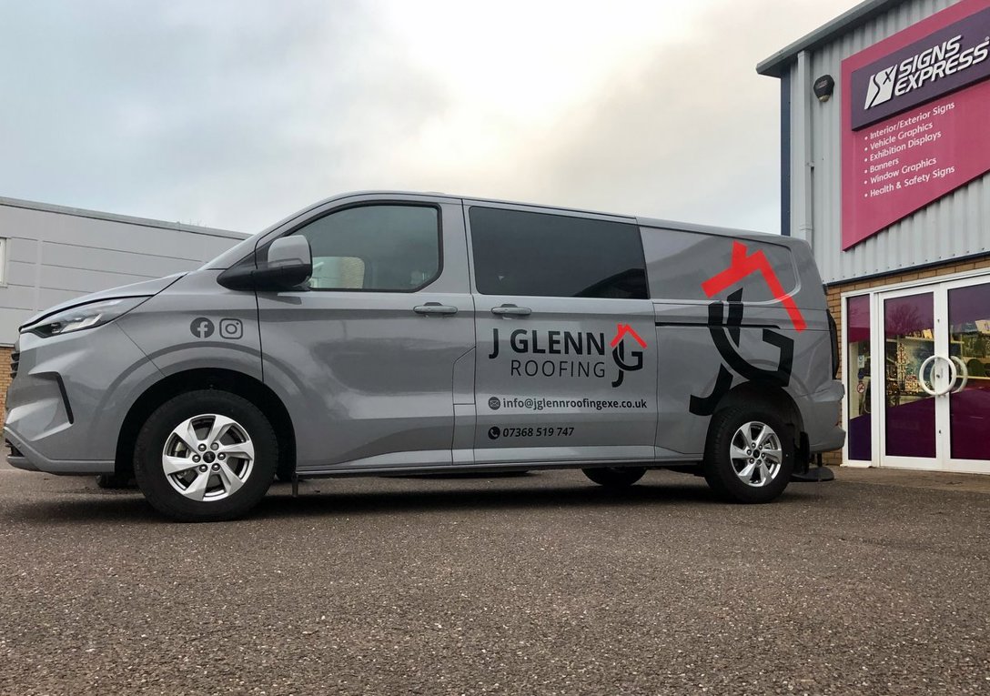 Black & Red Cut Vinyl Graphics On A Grey Double Cab Ford Transit Custom