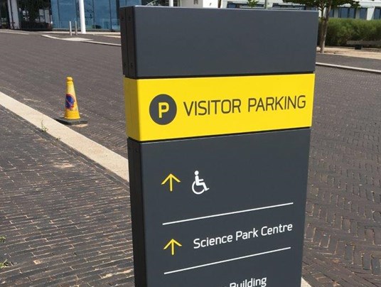Outdoor Business Signs Folded Metal Directional Totem With Vinyl Cut Decals For Exeter Science Park