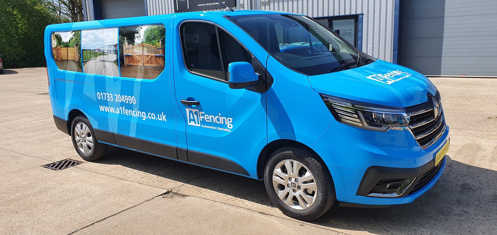 Full wrap for A1 fencing with blue vinyl and prints