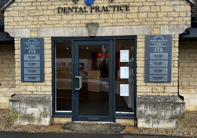 Dentist signs with name plates on satin chrome wall mounts 
