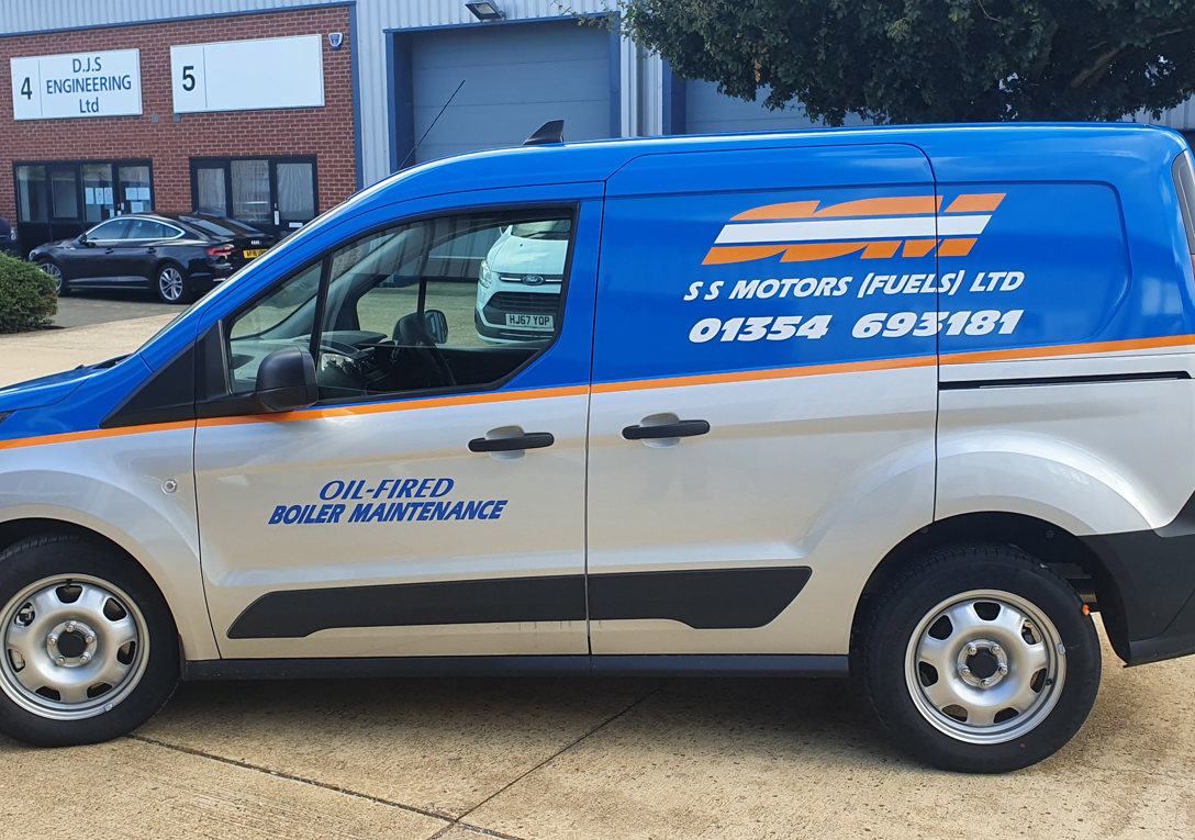 Silver van half wrapped with blue, orange and white vinyl