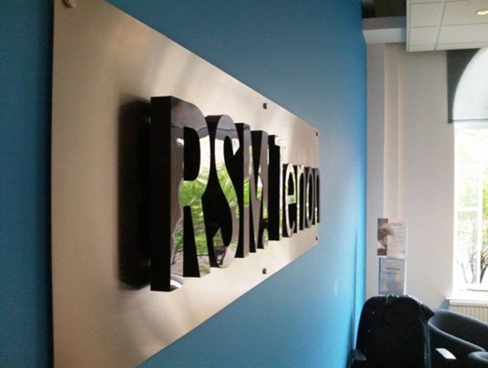 Built Up Acrylic Letters Fixed To A Brushed Stainless Steel Manchester