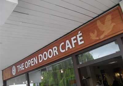 Wood Effect Printed Fascia Graphics For The Open Door Cafe Warwick