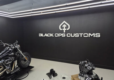 Black Ops Customs wall sign with built up letters