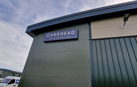 Illuminated warehouse Flexface sign for  Cakehead