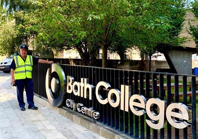 Signs Express Staff Member With Bath College Exterior Sign15