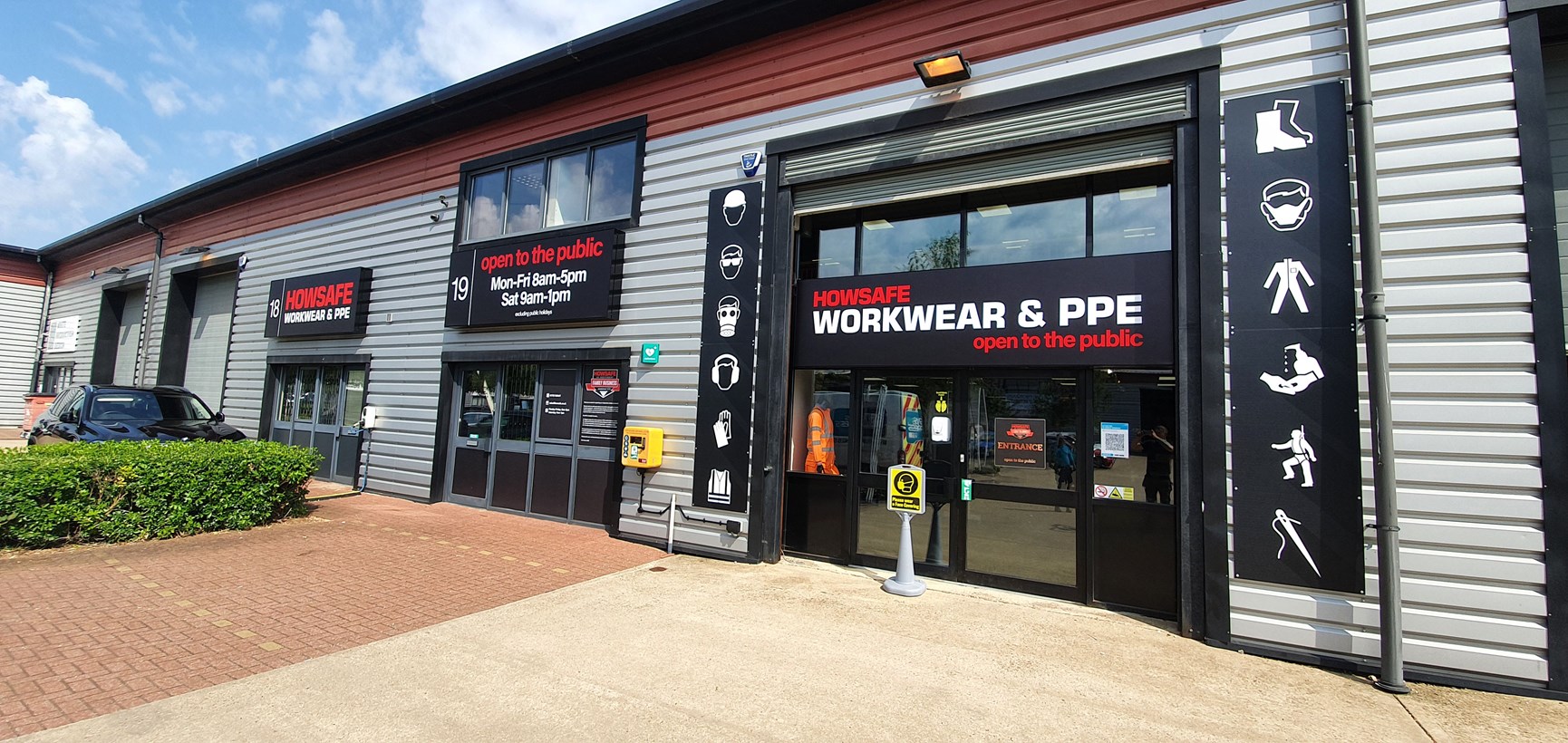 Illuminated tray signs for Howsafe Workwear & PPE shop