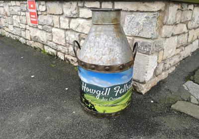 Bespoke vinyl graphics for an old Milk Churn