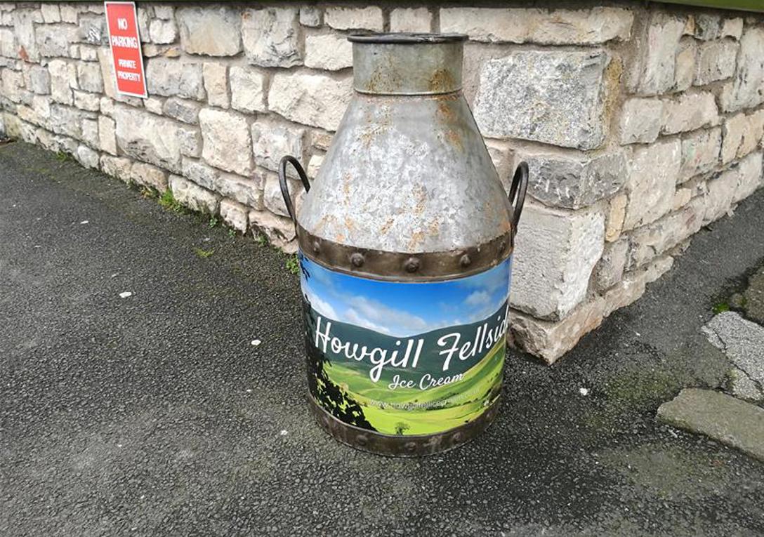 Bespoke vinyl graphics for an old Milk Churn