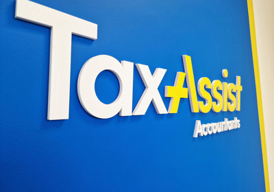Acrylic lettering wall sign for Tax Assist by Signs Express Peterborough