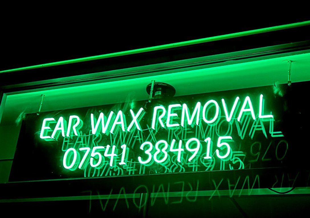 Neon Style Sign With Green Illumination
