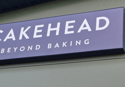 Cakehead Illuminated Sign 1 Close Up
