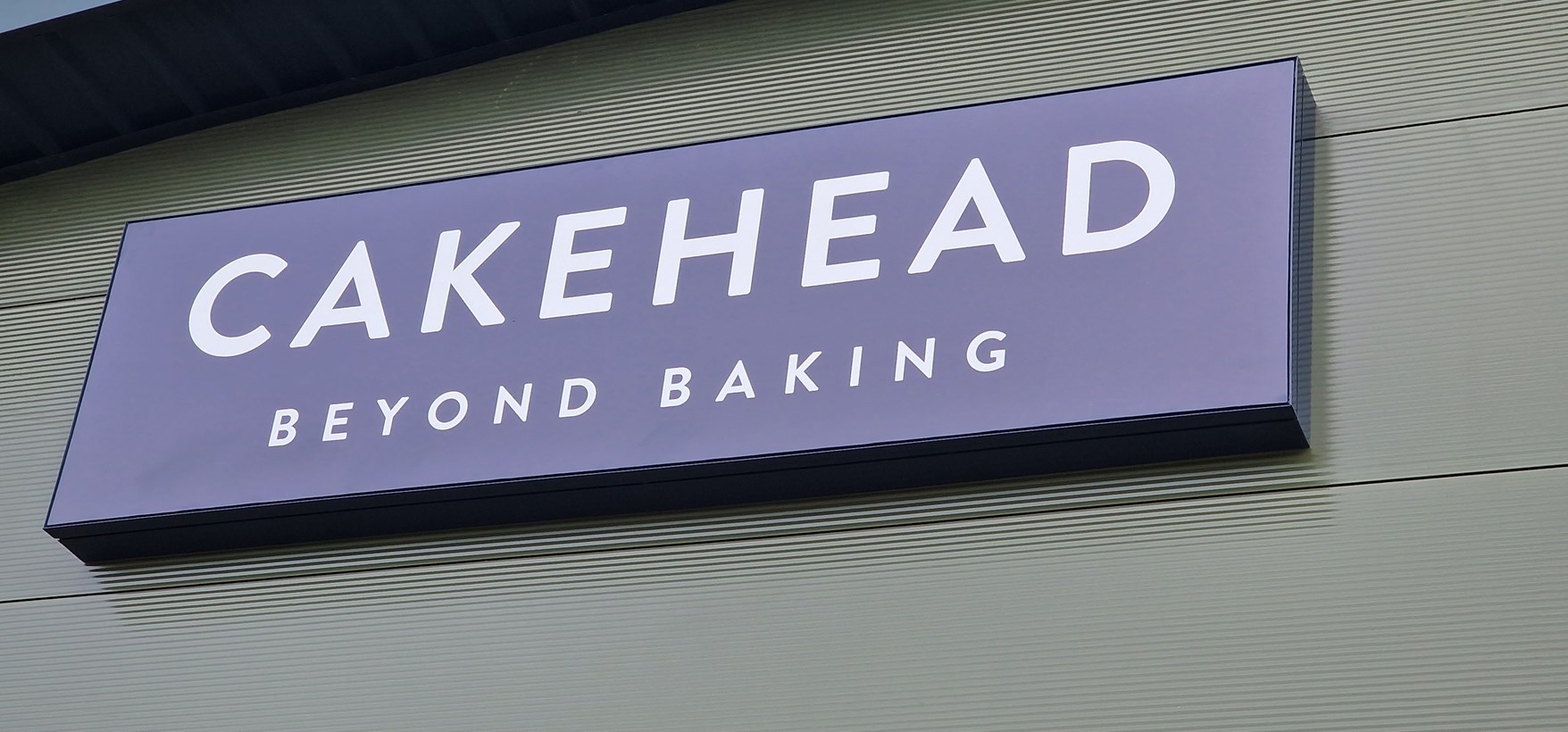 Cakehead Illuminated Sign 1 Close Up