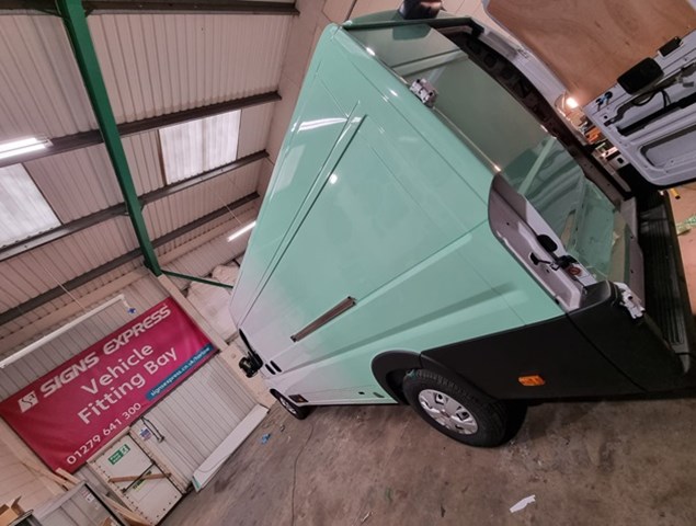 Faded Wrap Application In Progress At Signs Express