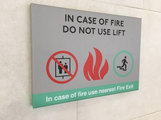 Health & Safety Signs Lift Warning Signage Incorporating Text And Picto Images For Guildhall Shopping Centre, Exeter