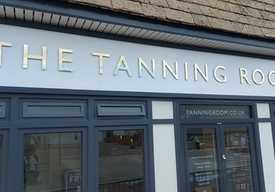 The Tanning Room Mirror Gold Flat Cut Letters Fascia Shop Sign (Swindon)