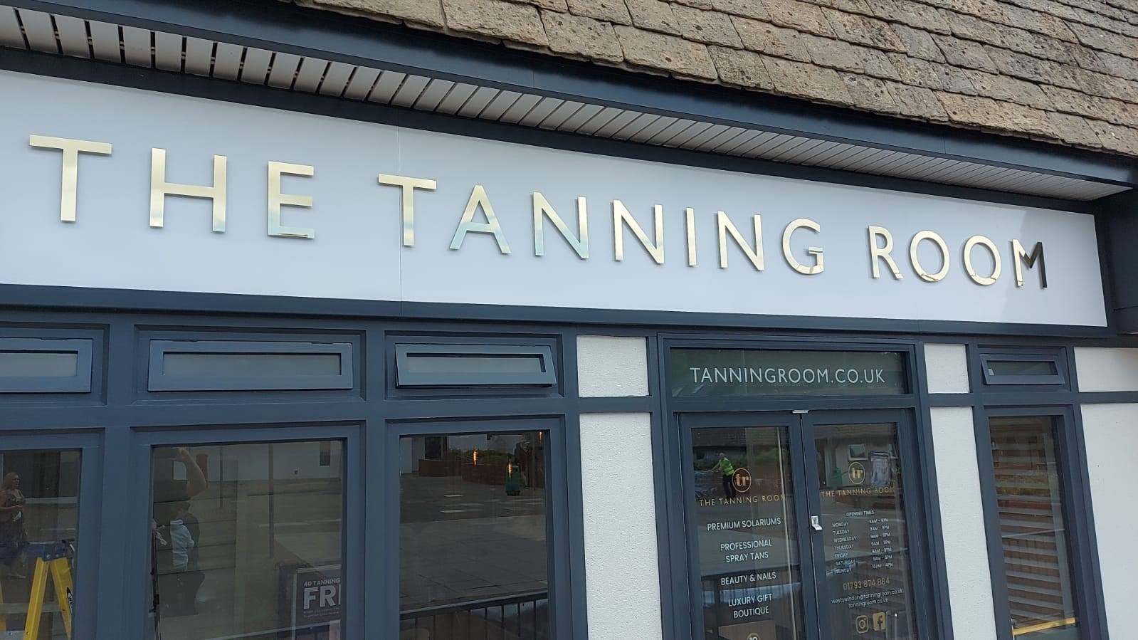 The Tanning Room Mirror Gold Flat Cut Letters Fascia Shop Sign (Swindon)