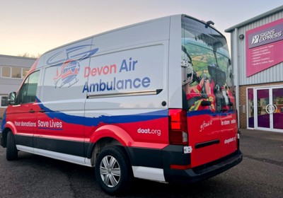 Partial Wrap On A White VW Crafter Including Full Height Wrap With Photo Image On Rear Doors